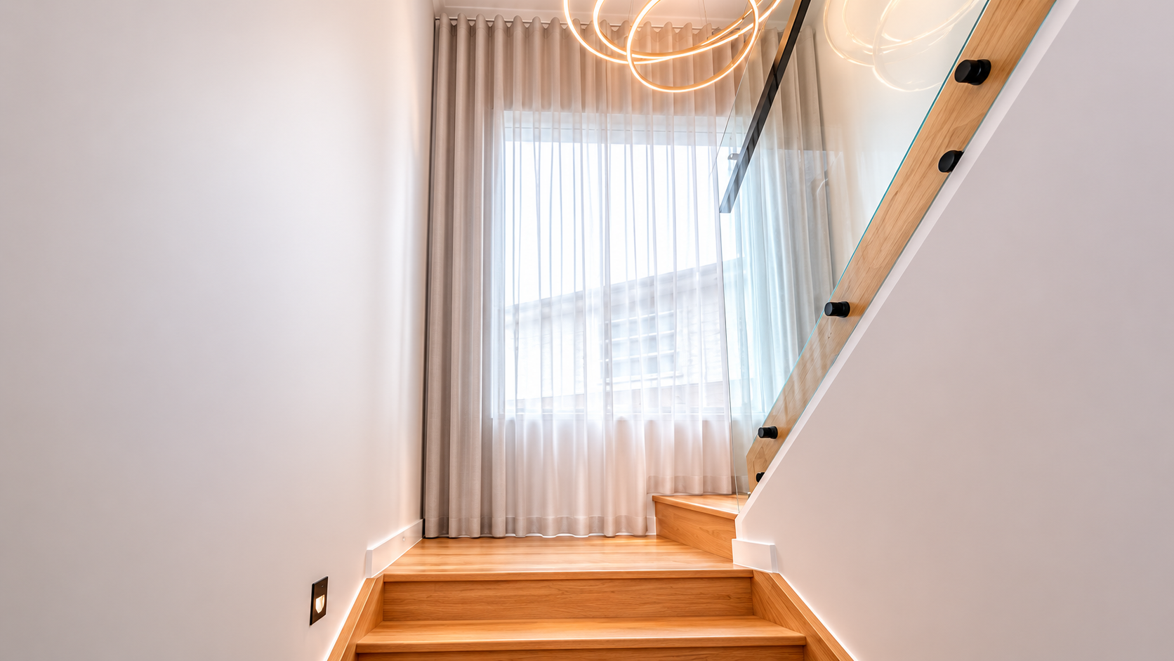Custom sheer curtains Brisbane staircase window — Security Screens Qld